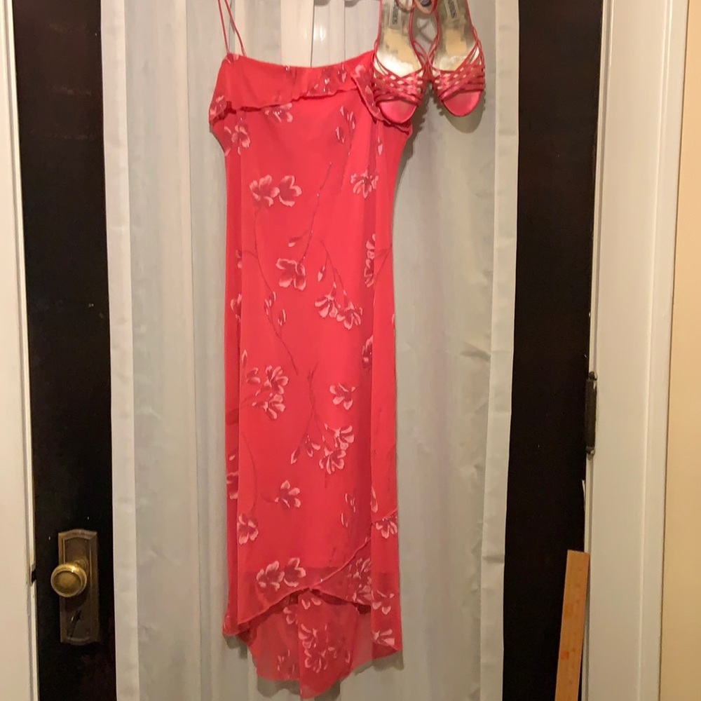 CLOSET CLEAR OUT! Bright pink with accent flowers. Asymmetrical hem
